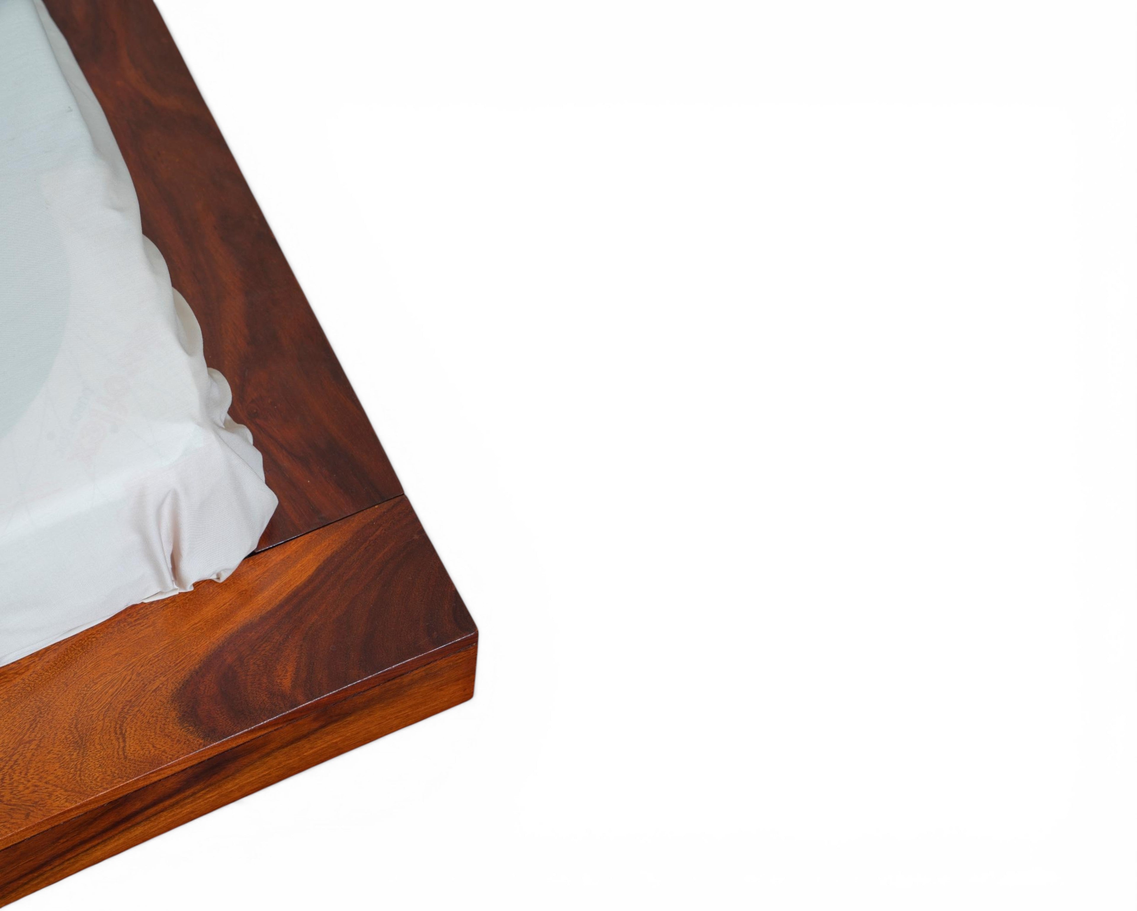 Nakoda Homes solid Sheesham wood platform bed frame with minimalist design and natural grain. Low profile.