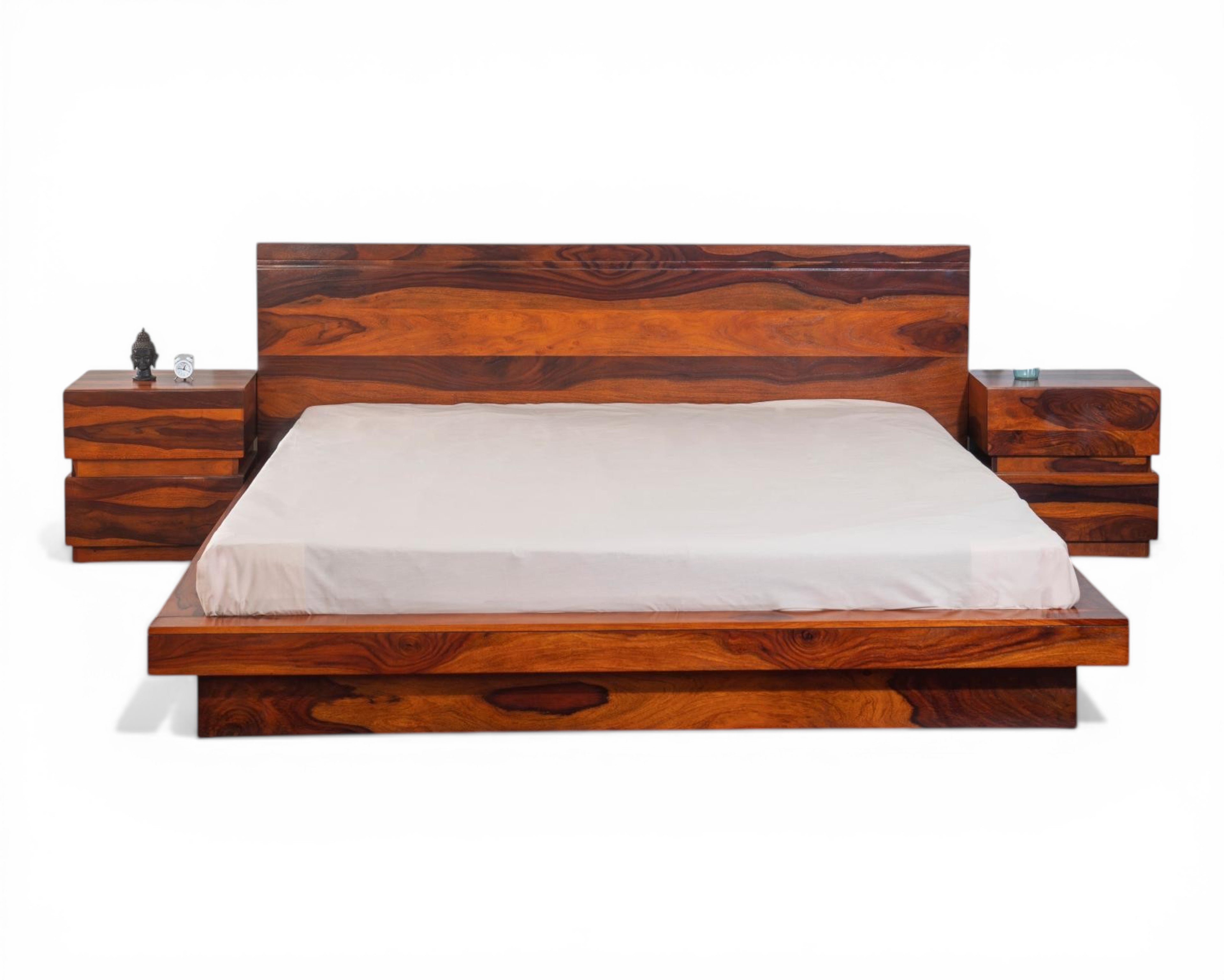 Nakoda Homes modern solid Sheesham wood platform bed frame with minimalist headboard and matching nightstands.