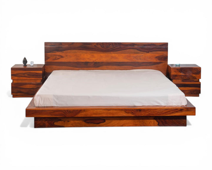 Nakoda Homes modern solid Sheesham wood platform bed frame with minimalist headboard and matching nightstands.