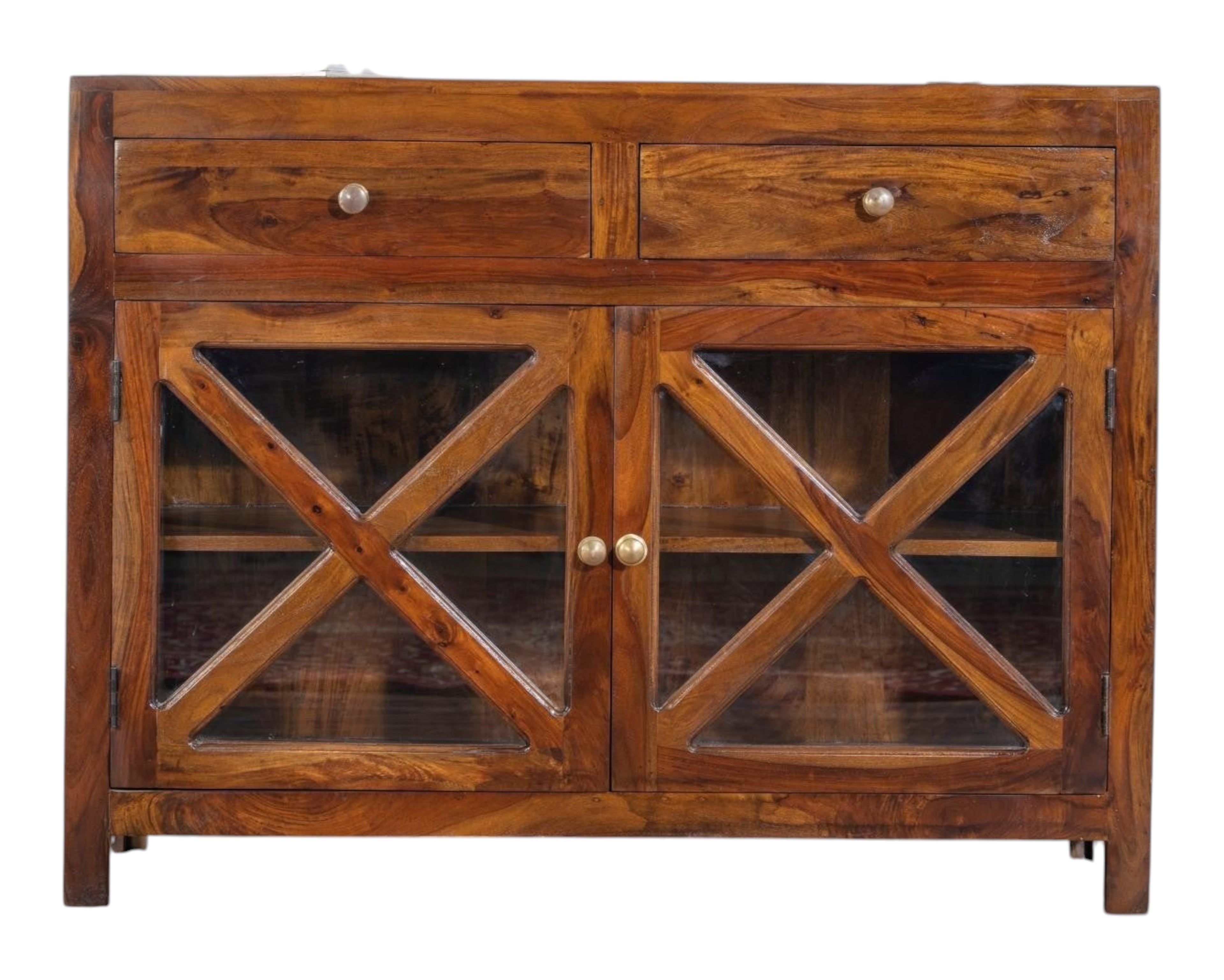 Nakoda Homes solid wood cabinet with two drawers and criss-cross glass doors. Warm wood tone, ideal for dining or living room storage.