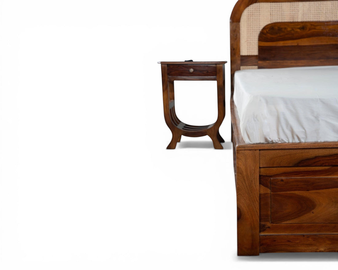Nakoda Homes solid wood platform bed with natural cane headboard and storage drawers. Warm wood finish.