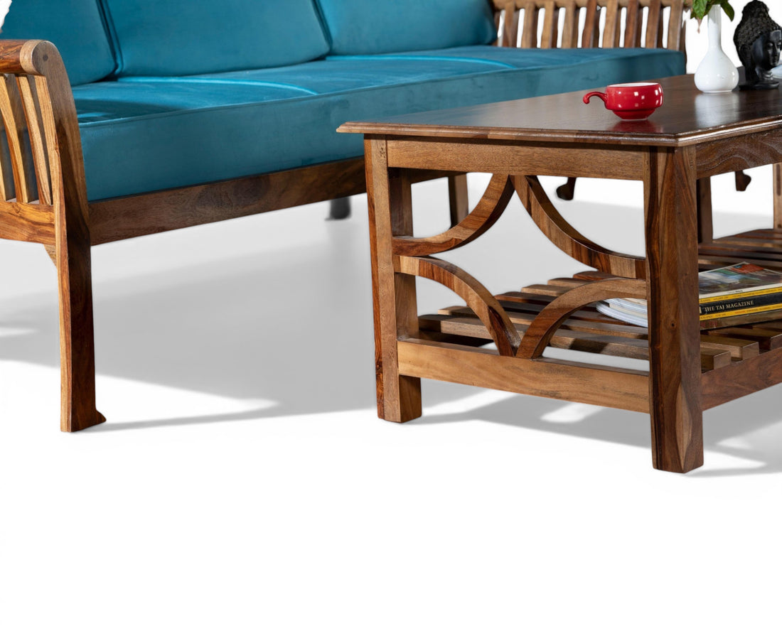 Nakoda Homes solid wood coffee table with geometric lattice sides and slatted shelf. Warm wood tones.