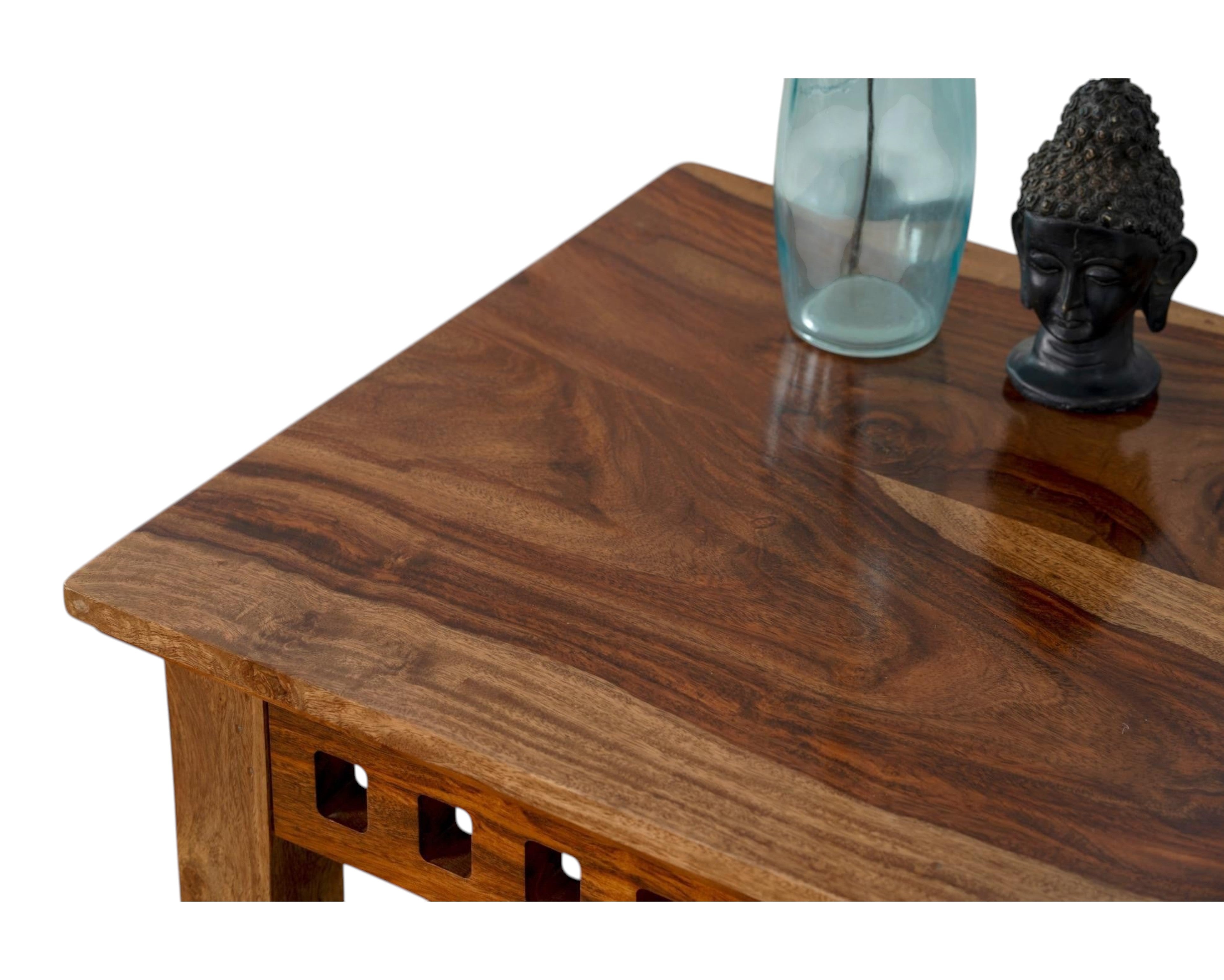 Nakoda Homes solid wood console table with two drawers and carved detailing. Rich, natural wood with visible grain.