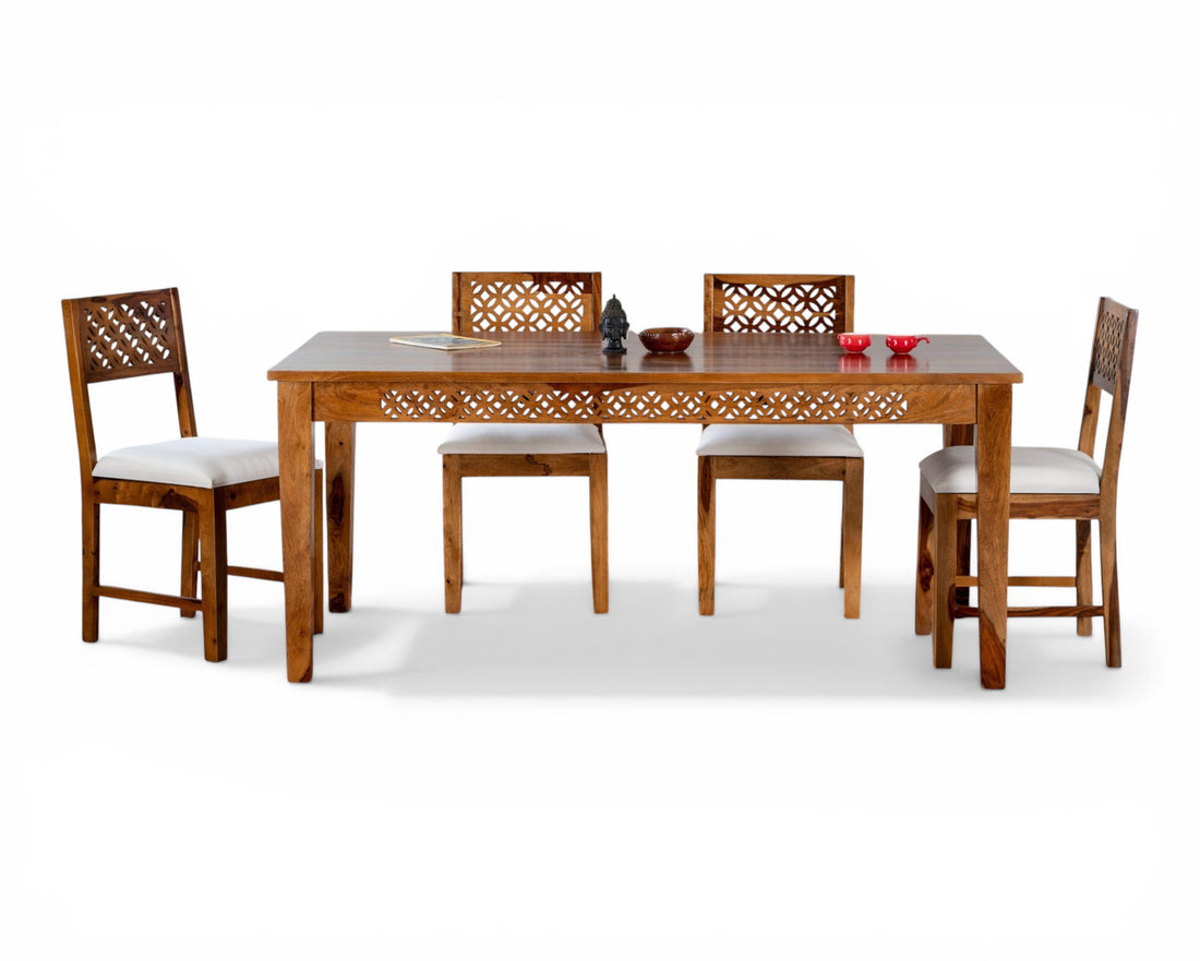 Nakoda Homes solid wood dining set with carved chair backs and table apron, white cushioned seats.