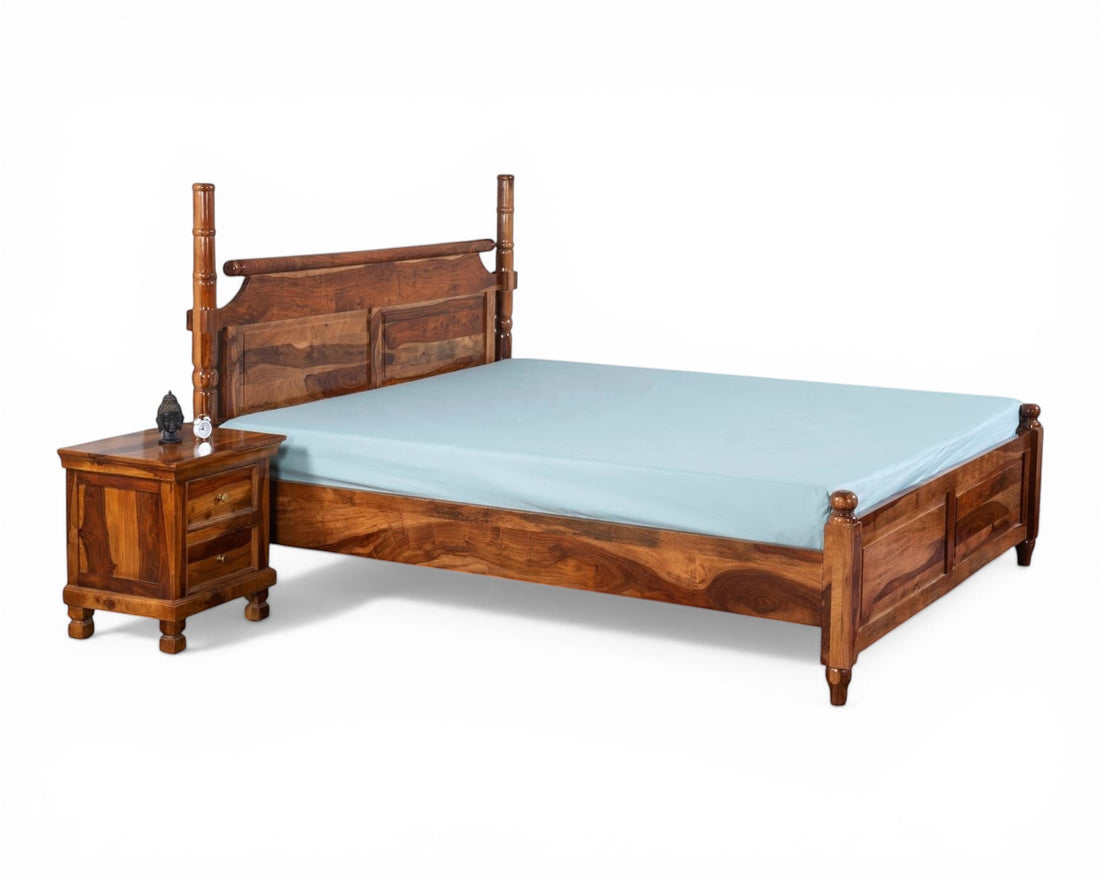 Nakoda Homes queen-size solid Sheesham wood four poster bed frame with carved headboard and honey-brown finish.
