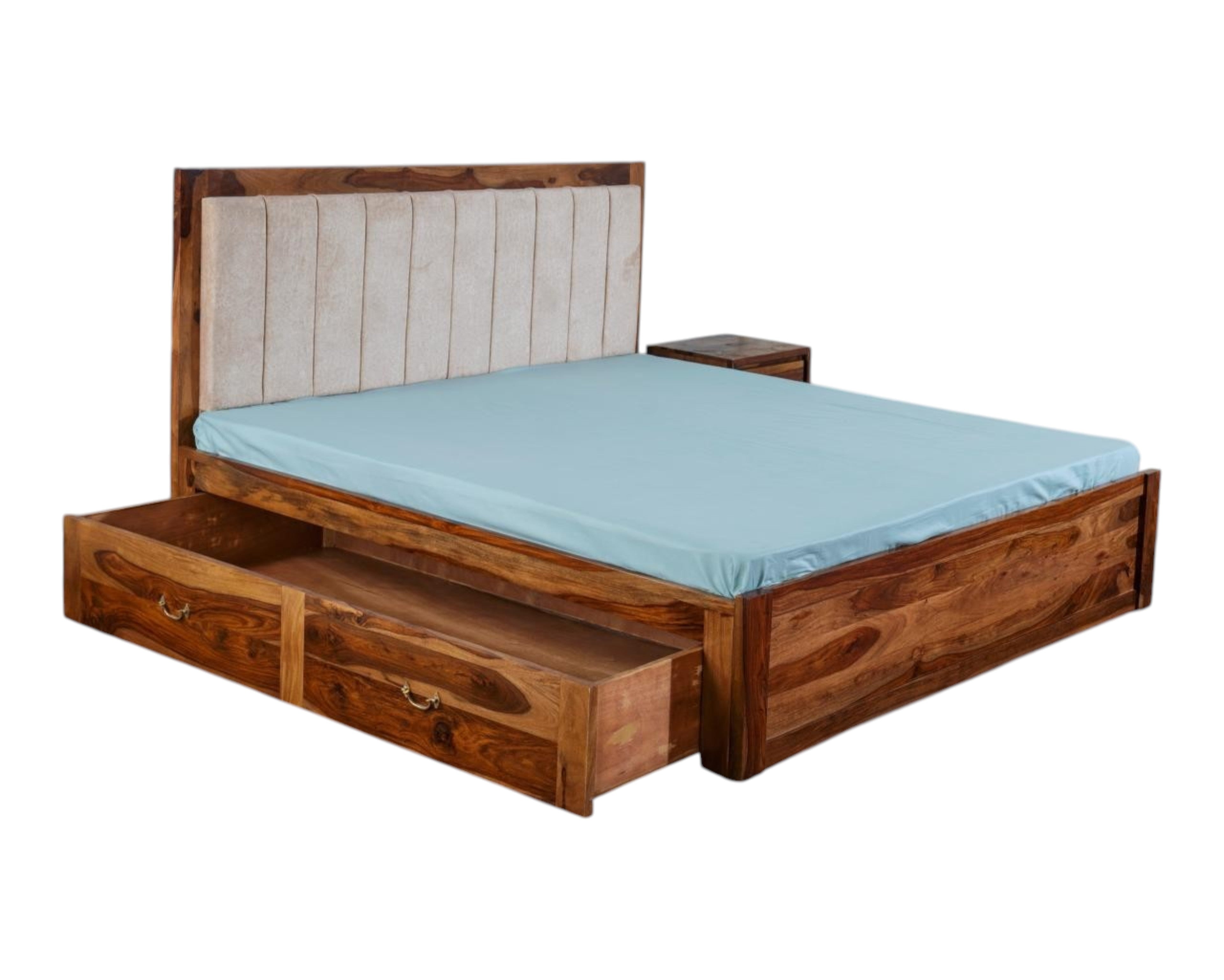 Nakoda Homes solid wood platform bed with upholstered headboard and storage drawers. Natural wood finish.