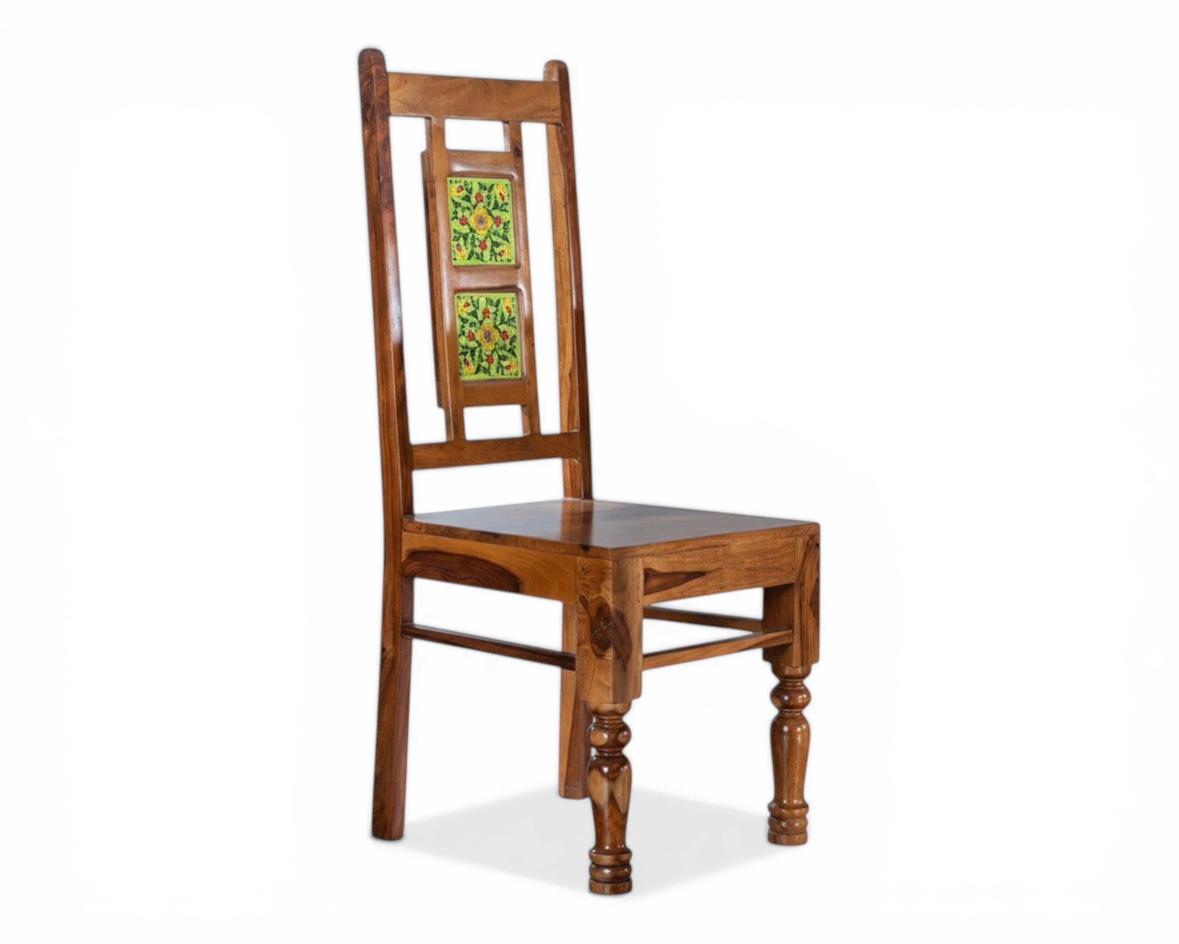 Nakoda Homes wooden dining chair with carved legs and green ceramic tile backrest with floral pattern.